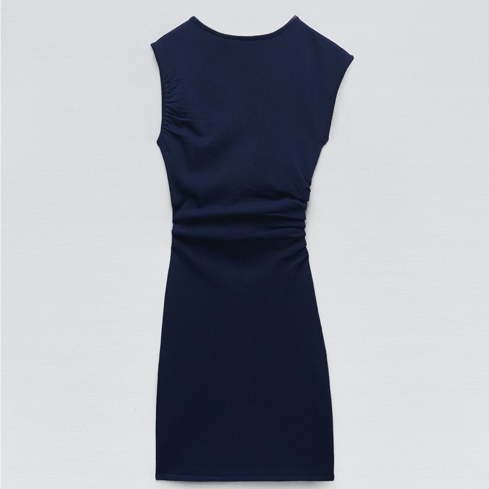Draped knit dress.